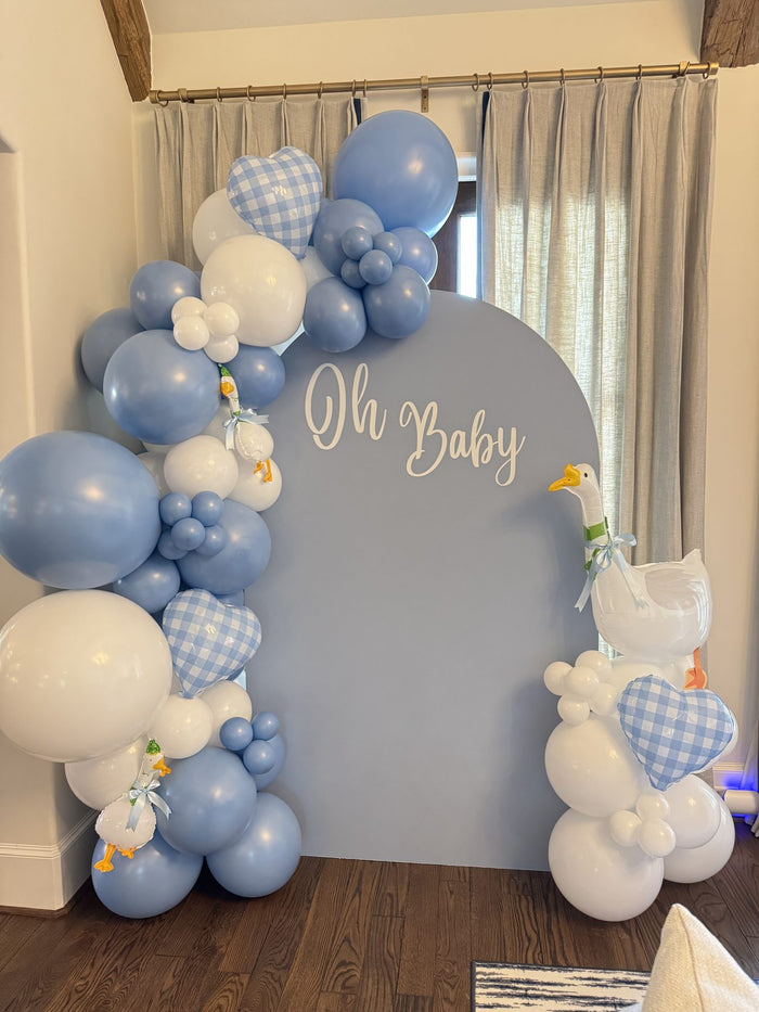 Dusty blue Oh Baby balloon backdrop for a Houston baby shower