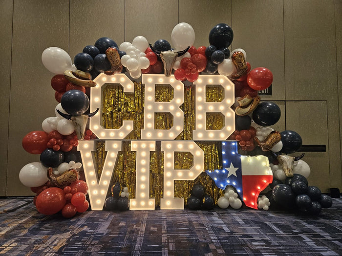 CBB VIP light-up marquee letters with Texas themed balloon garland for a corporate event